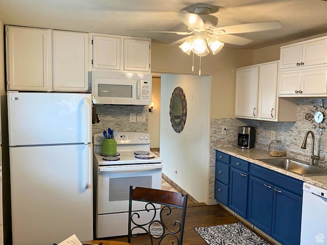 955 N Catherine St, Salt Lake City, UT 84116 - kitchen with white appliances, blue cabinets, a sink, ceiling fan, and tasteful backsplash