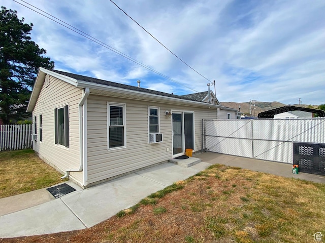 955 N Catherine St, Salt Lake City, UT 84116 - rear view of property with a patio area and cooling unit