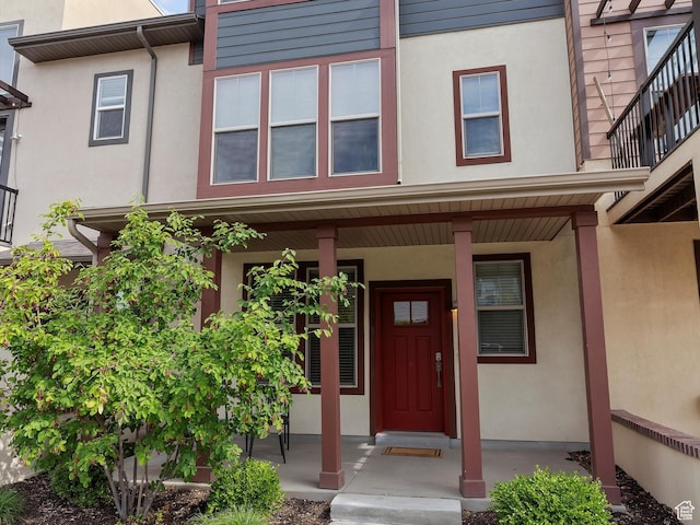 335 E Park Blvd S, Ogden, UT 84401 - view of exterior entry with a porch and stucco siding