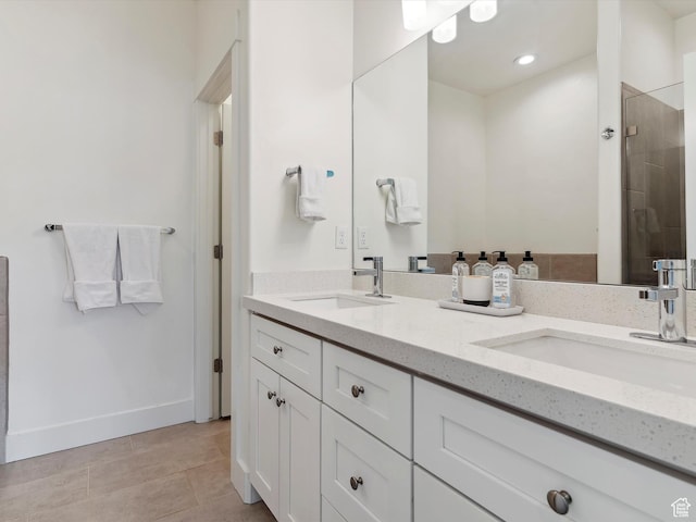 335 E Park Blvd S, Ogden, UT 84401 - bathroom with double vanity, a tile shower, tile patterned floors, and baseboards