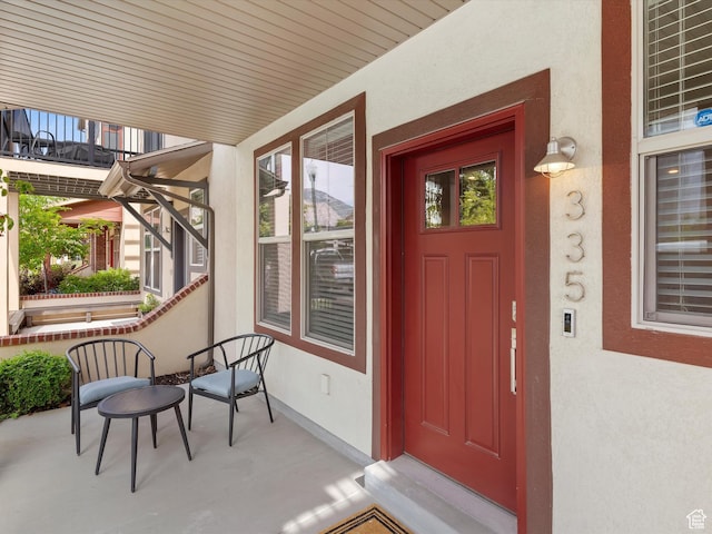335 E Park Blvd S, Ogden, UT 84401 - view of exterior entry with stucco siding and covered porch