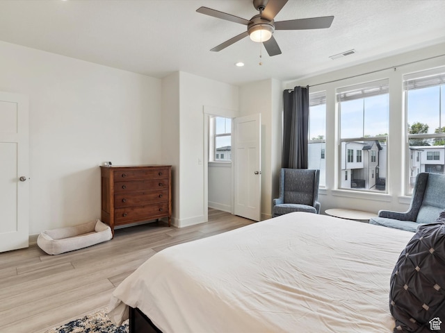 335 E Park Blvd S, Ogden, UT 84401 - bedroom featuring multiple windows, light wood-style flooring, recessed lighting, a ceiling fan, and baseboards