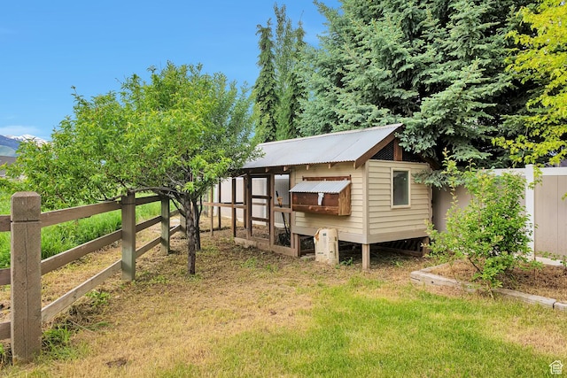 2101 W 325 S, Mapleton, UT 84664 - back of house with exterior structure, an outbuilding, and a metal roof