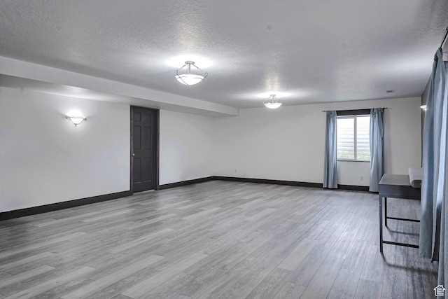 2101 W 325 S, Mapleton, UT 84664 - below grade area featuring a textured ceiling and light wood-style flooring