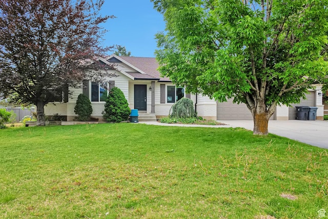 2101 W 325 S, Mapleton, UT 84664 - view of front of home with driveway, a front yard, and a garage
