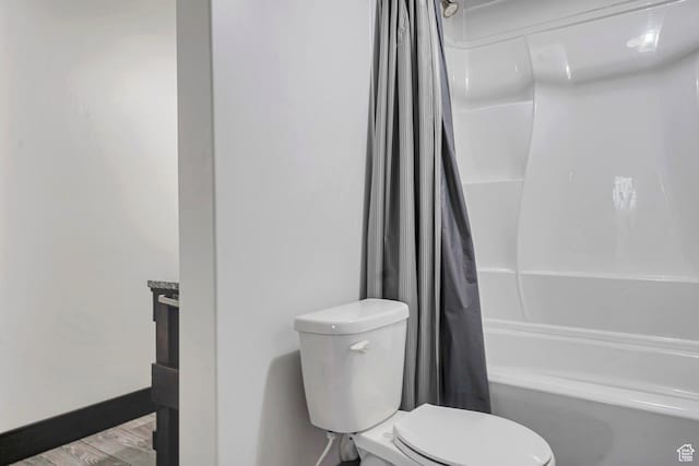 2101 W 325 S, Mapleton, UT 84664 - full bath featuring shower / bath combo with shower curtain, wood finished floors, and vanity