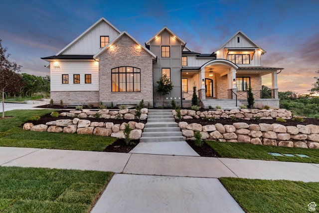 1366 S 370 E, Salem, UT 84653 - modern farmhouse style home with board and batten siding, stone siding, covered porch, a yard, and stairway