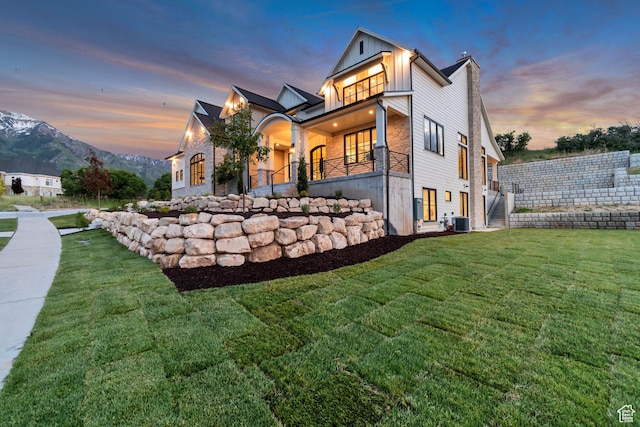 1366 S 370 E, Salem, UT 84653 - view of front of house with central AC unit, a front yard, board and batten siding, and a mountain view