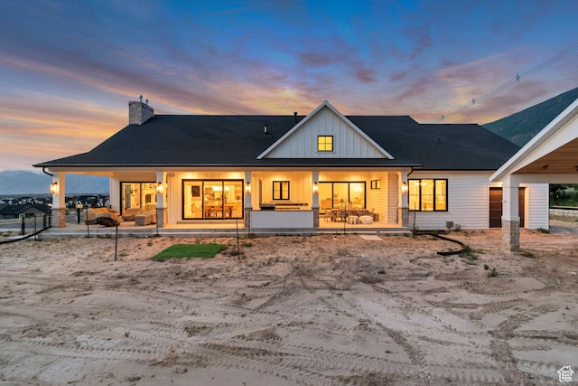 1366 S 370 E, Salem, UT 84653 - back of property at dusk featuring board and batten siding and a chimney