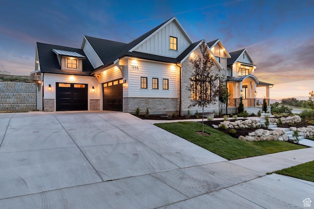 1366 S 370 E, Salem, UT 84653 - modern farmhouse style home featuring board and batten siding, stone siding, concrete driveway, a front lawn, and a garage