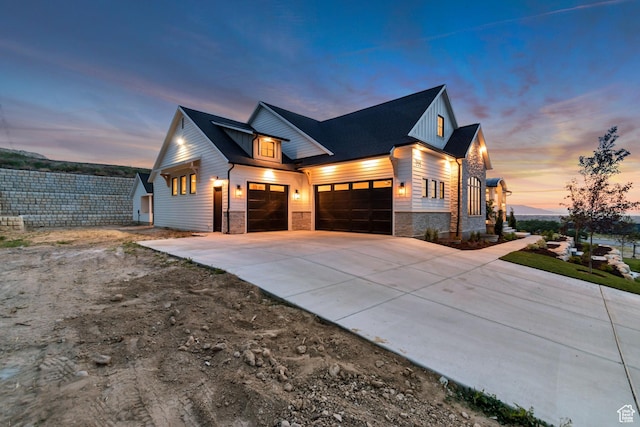 1366 S 370 E, Salem, UT 84653 - view of front facade featuring an attached garage, stone siding, driveway, and board and batten siding