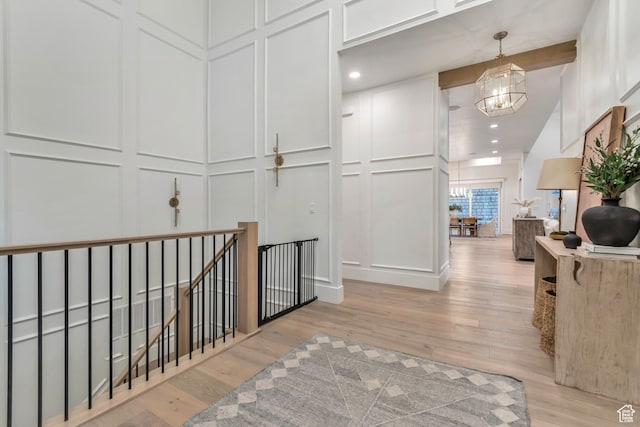 1366 S 370 E, Salem, UT 84653 - corridor with a decorative wall, a chandelier, light wood-style floors, an upstairs landing, and recessed lighting