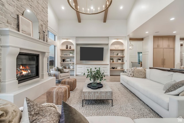 1366 S 370 E, Salem, UT 84653 - living room with wood finished floors, a fireplace, recessed lighting, beam ceiling, and a chandelier