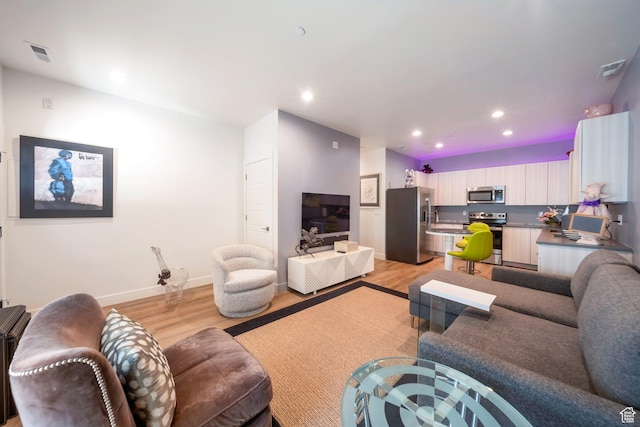 3610 S 805 E Unit 233, Millcreek, UT 84106 - living room featuring light wood-style floors, recessed lighting, and baseboards