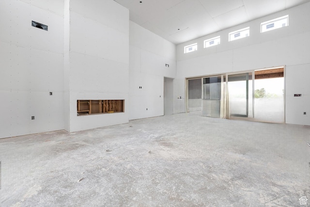 1137 W 4310 S, Hurricane, UT 84737 - unfurnished living room with a towering ceiling