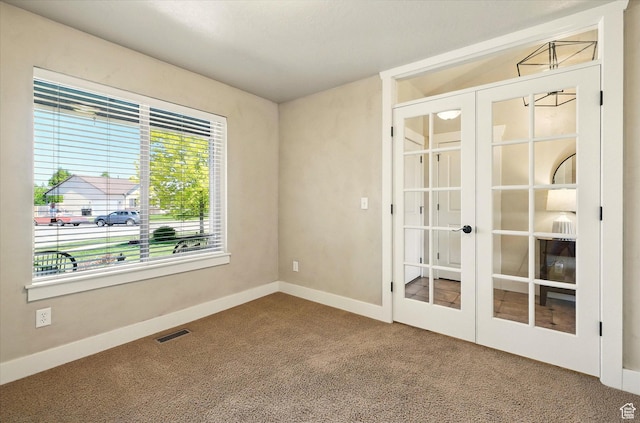 674 S 150 W, Hyde Park, UT 84318 - carpeted spare room with french doors and baseboards