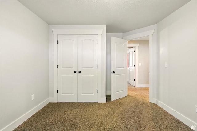 674 S 150 W, Hyde Park, UT 84318 - unfurnished bedroom featuring carpet flooring, a closet, and baseboards