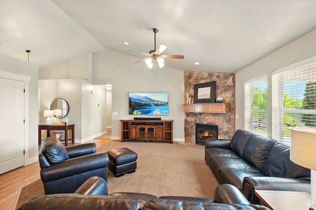674 S 150 W, Hyde Park, UT 84318 - living room with lofted ceiling, a ceiling fan, a fireplace, and baseboards