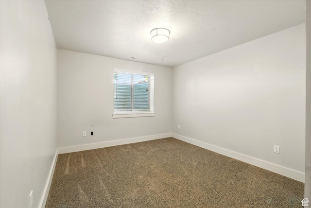 674 S 150 W, Hyde Park, UT 84318 - carpeted empty room with baseboards and a textured ceiling
