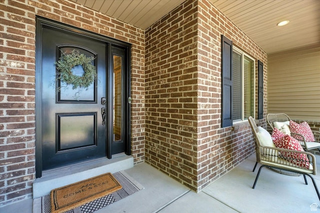 674 S 150 W, Hyde Park, UT 84318 - property entrance featuring brick siding and a porch