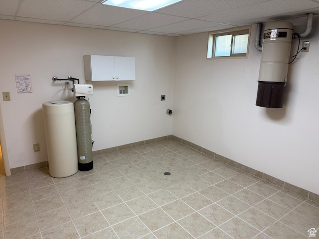 5253 S 2150 W, Roy, UT 84067 - basement featuring a water softener, a central vacuum unit, light tile patterned flooring, and a paneled ceiling