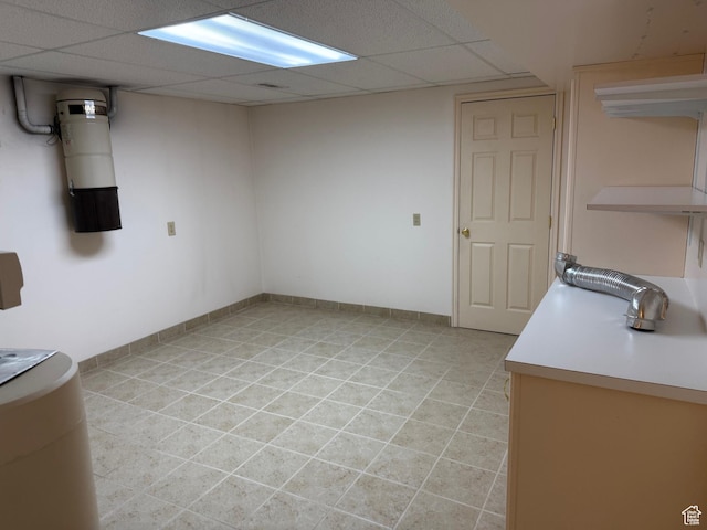 5253 S 2150 W, Roy, UT 84067 - finished basement featuring a central vacuum unit, light tile patterned floors, and a paneled ceiling