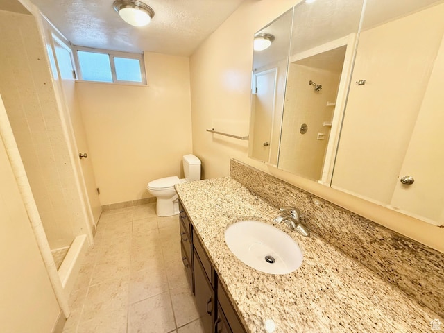 5253 S 2150 W, Roy, UT 84067 - full bath with vanity, tile patterned floors, toilet, baseboards, and a shower