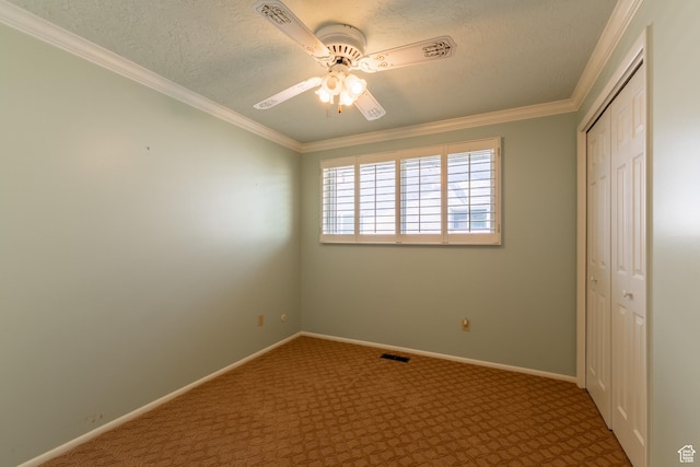 5253 S 2150 W, Roy, UT 84067 - unfurnished bedroom with a closet, carpet flooring, baseboards, a textured ceiling, and crown molding