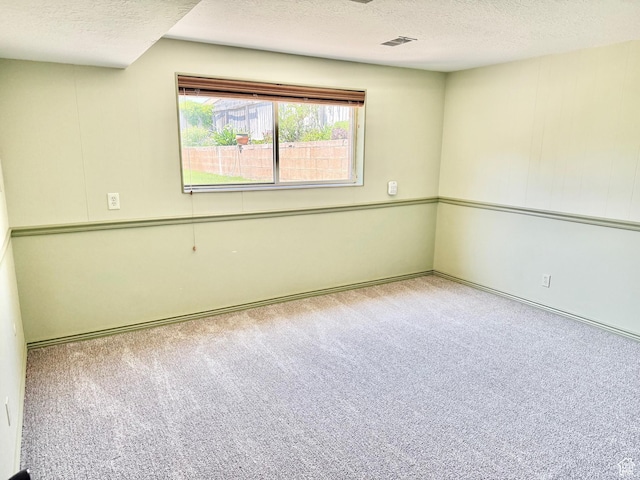5253 S 2150 W, Roy, UT 84067 - carpeted spare room with a textured ceiling and baseboards