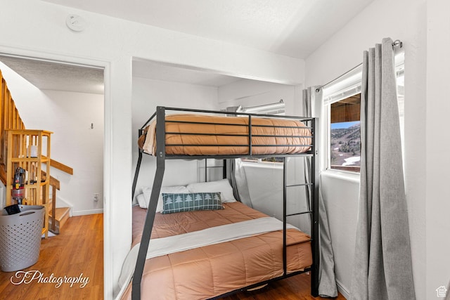 332 W Pinehurst Dr, Brian Head, UT 84719 - bedroom with wood finished floors and baseboards
