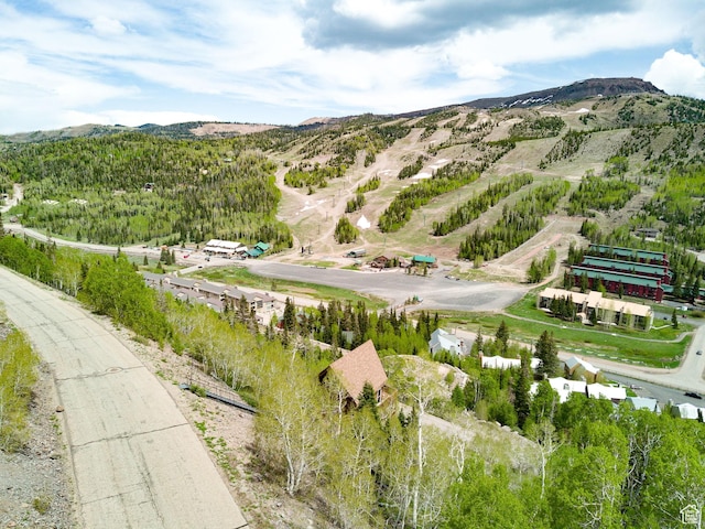 332 W Pinehurst Dr, Brian Head, UT 84719 - aerial view of property and surrounding area with a mountainous background