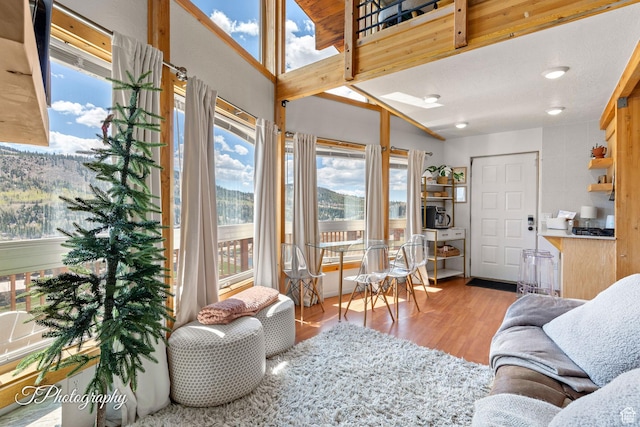 332 W Pinehurst Dr, Brian Head, UT 84719 - living area featuring healthy amount of natural light and wood finished floors