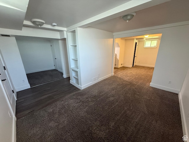 2168 S Harrison Blvd, Ogden, UT 84401 - below grade area featuring baseboards, built in features, carpet, and wood finished floors