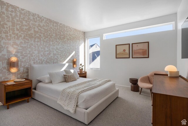 3147 S Mesa Verde Cir, Hurricane, UT 84737 - carpeted bedroom with wallpapered walls, multiple windows, and baseboards