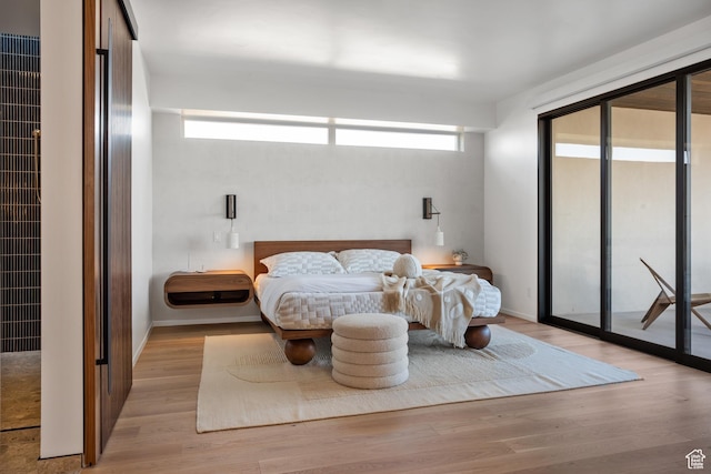 3147 S Mesa Verde Cir, Hurricane, UT 84737 - bedroom featuring access to outside and light wood finished floors