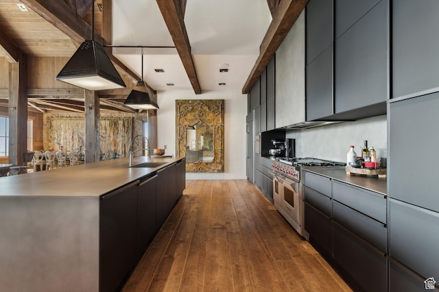 7701 N W Hills Trl, Park City, UT 84098 - kitchen with range with two ovens, a sink, beam ceiling, modern cabinets, and dark wood-style flooring