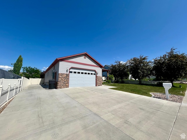 319 S 600 E, Payson, UT 84651 - view of home's exterior with stone siding and driveway