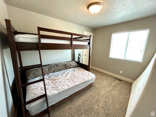 319 S 600 E, Payson, UT 84651 - carpeted bedroom with a textured ceiling and baseboards