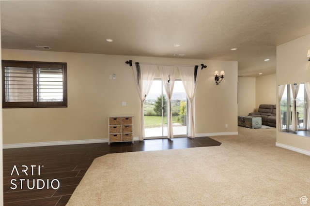 2565 N Sunset Vw Unit 14, Lehi, UT 84043 - living room featuring recessed lighting, baseboards, and wood finished floors