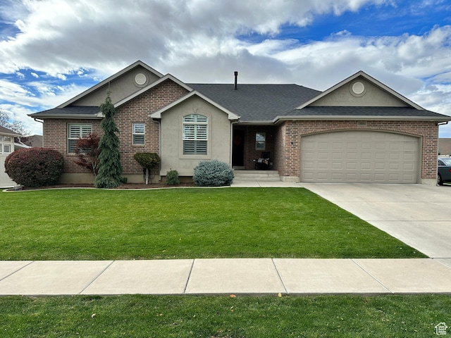 705 N 2750 W, West Point, UT 84015 - view of front of home with driveway, an attached garage, a front yard, brick siding, and roof with shingles