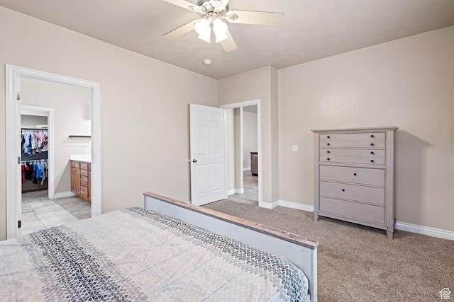 1500 E Mesa View Ln, Washington, UT 84780 - bedroom featuring baseboards, ceiling fan, ensuite bath, and carpet floors