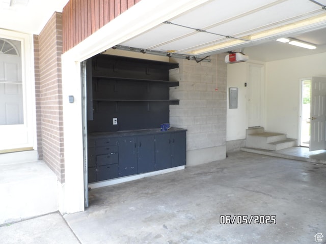 288 W 775 N, Logan, UT 84321 - garage with electric panel and a garage door opener