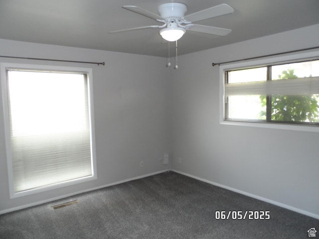 288 W 775 N, Logan, UT 84321 - spare room featuring ceiling fan, dark colored carpet, and baseboards
