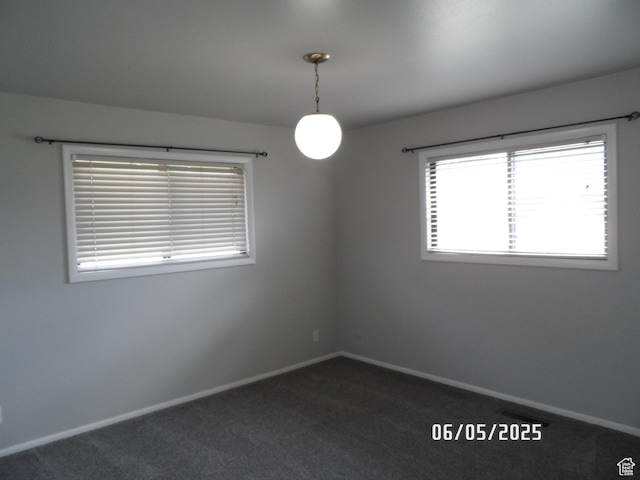 288 W 775 N, Logan, UT 84321 - unfurnished room with baseboards and dark carpet
