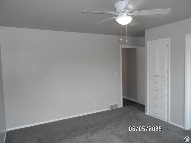 288 W 775 N, Logan, UT 84321 - unfurnished bedroom with dark carpet, baseboards, and ceiling fan