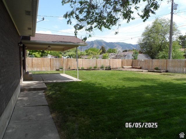288 W 775 N, Logan, UT 84321 - view of yard with a mountain view and a patio