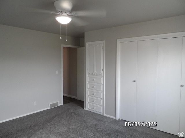 288 W 775 N, Logan, UT 84321 - unfurnished bedroom featuring dark carpet, a closet, ceiling fan, and baseboards