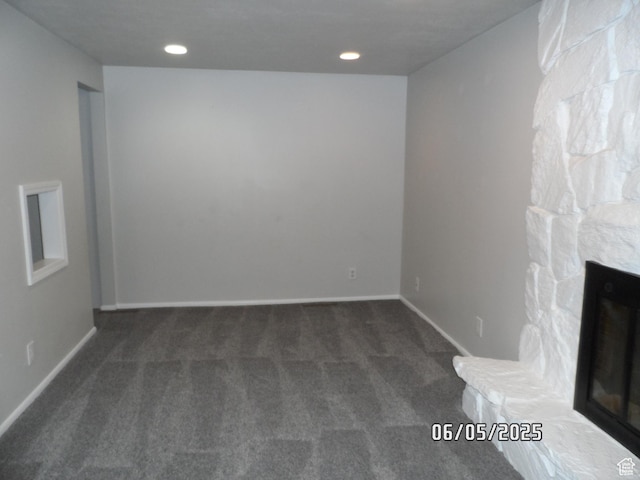 288 W 775 N, Logan, UT 84321 - unfurnished living room featuring carpet floors, baseboards, and recessed lighting