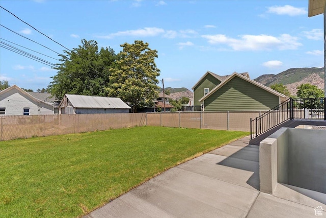874 Cahoon St, Ogden, UT 84401 - view of yard with a patio and a mountain view