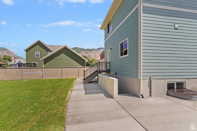 874 Cahoon St, Ogden, UT 84401 - view of yard featuring a mountain view and a patio area